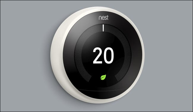 Google Nest Thermostat on grey wall