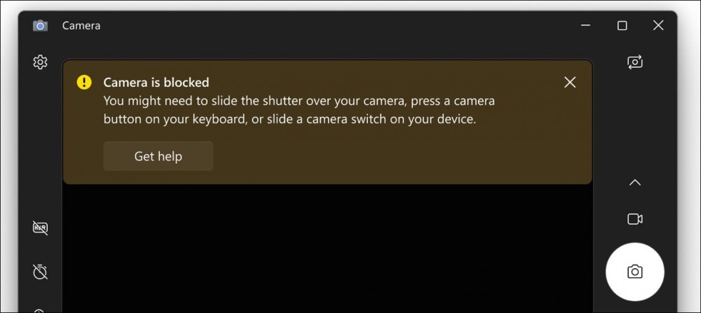 image of a warning that says "Camera is blocked. You might need to slide the shutter over your camera, press a camera button on your keyboard, or slide a camera switch on your device."